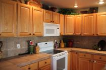 Faded Orange Oak Cabinets